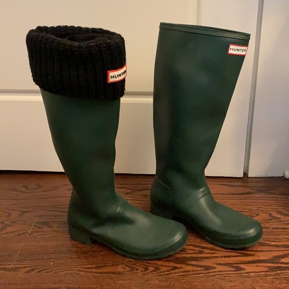 Green tall Hunter rain boots with black socks, size 8 - Picture 3 of 5